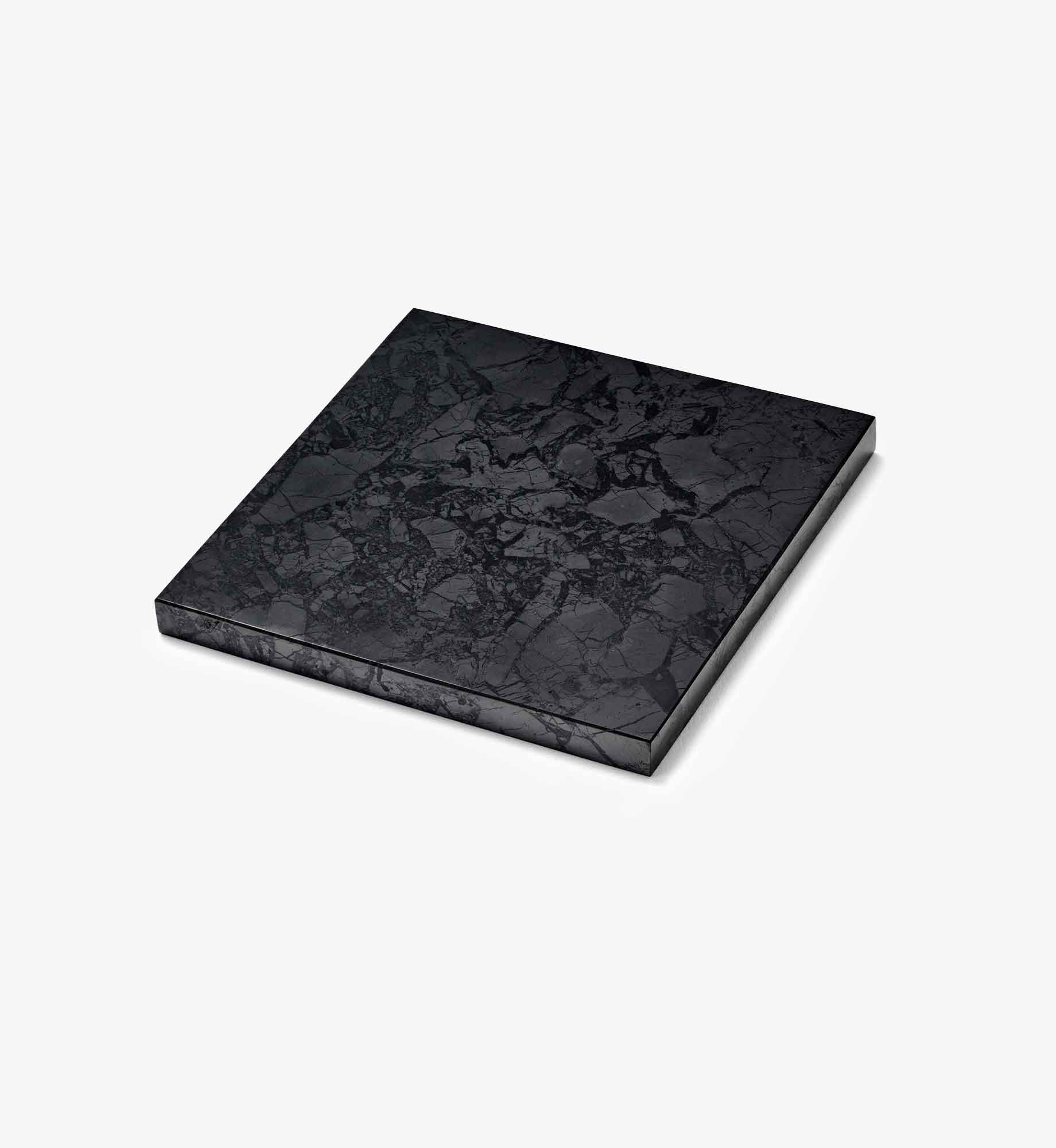 Liegend dargestellte Platte Lotte aus EssenceX-Schungit von Beyond Matter – mit natürlicher Maserung und polierter Oberfläche.